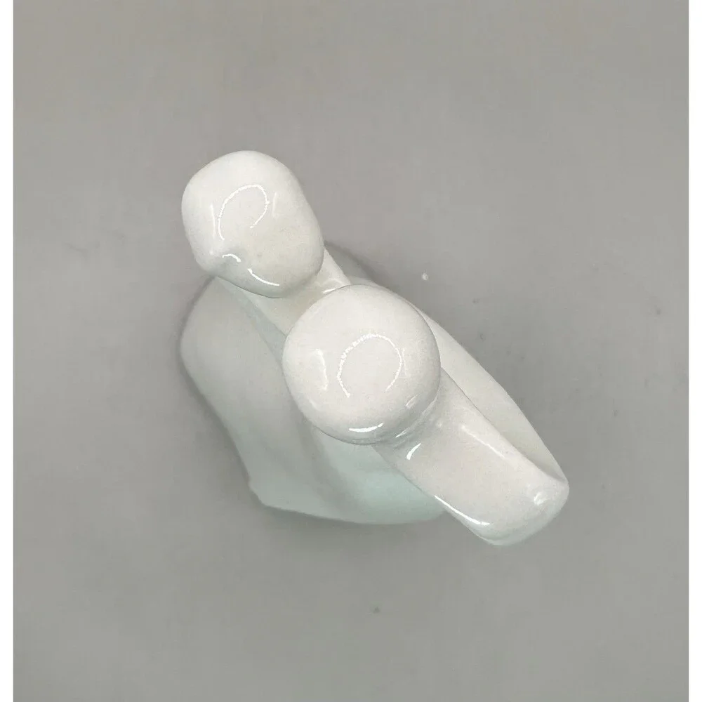 Elegant White Ceramic Couple Figurine Heart Embrace Minimalist Wedding Decor